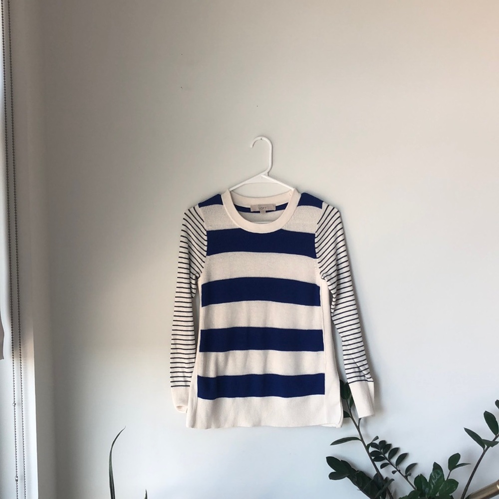 Blue striped long sleeve sweater.